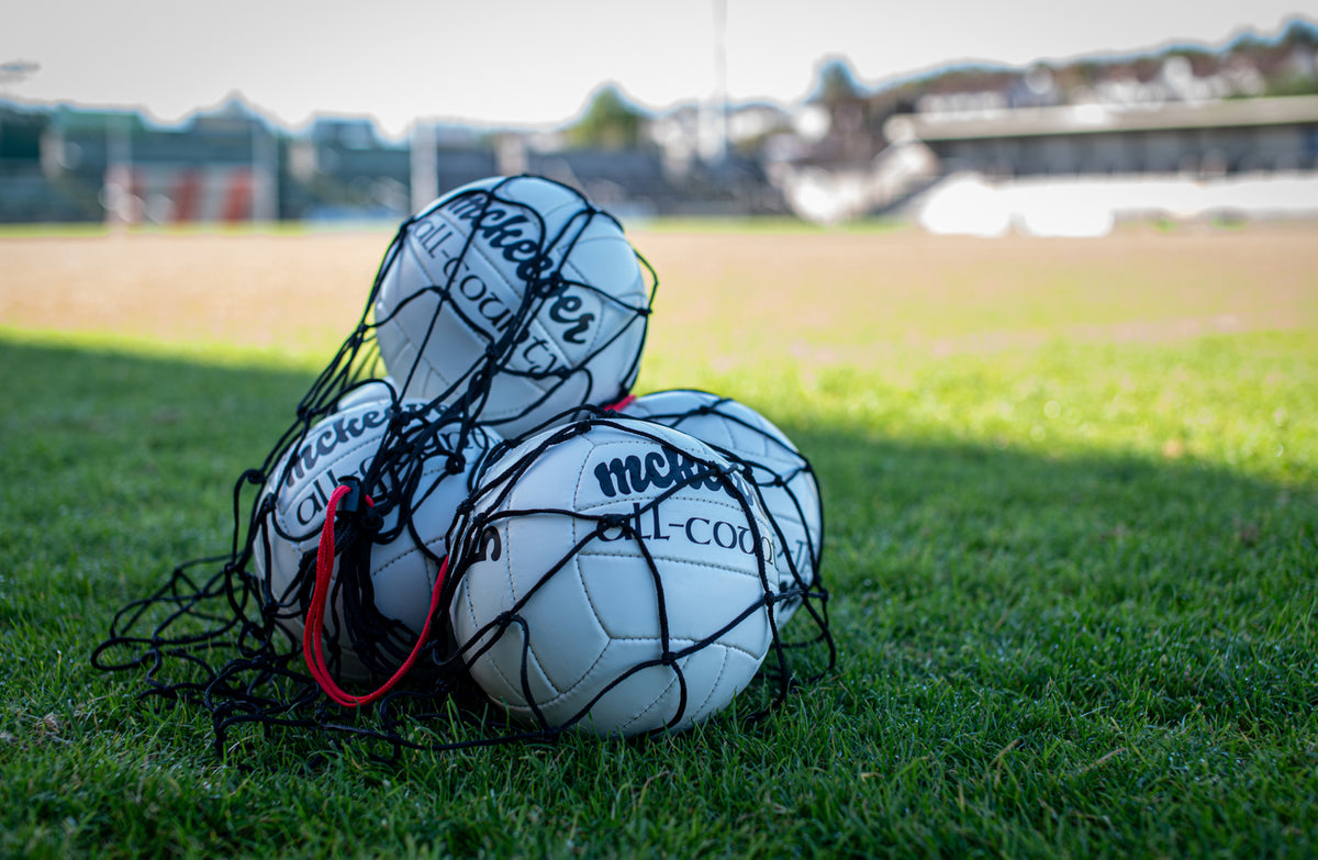 McKvr GAA footballs on a pitch