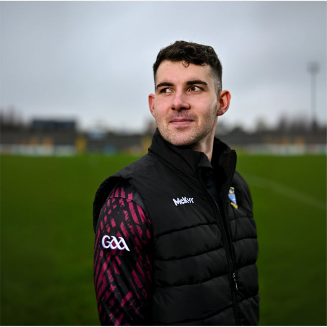 Westmeath GAA player in a McKvr jacket