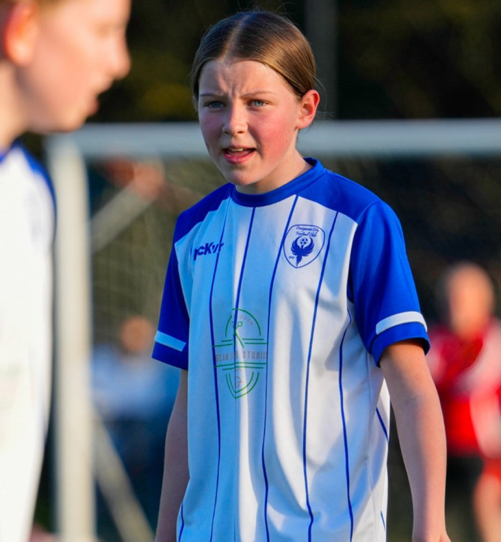 Soccer player in a McKvr jersey
